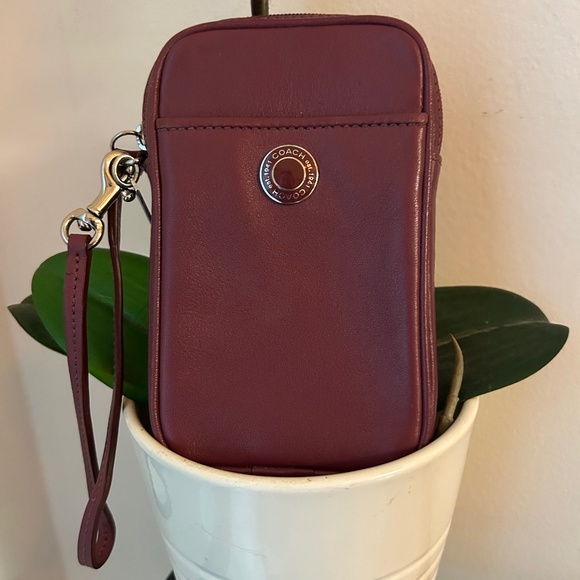 Coach Handbags - Coach Maroon Mini Wristlet Or Cellphone Holder With Silver Hardware